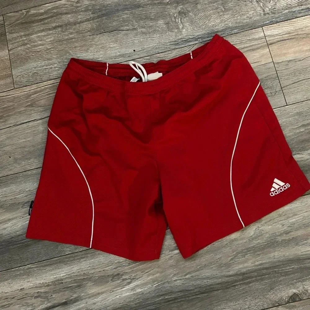 Red Adidas shorts-